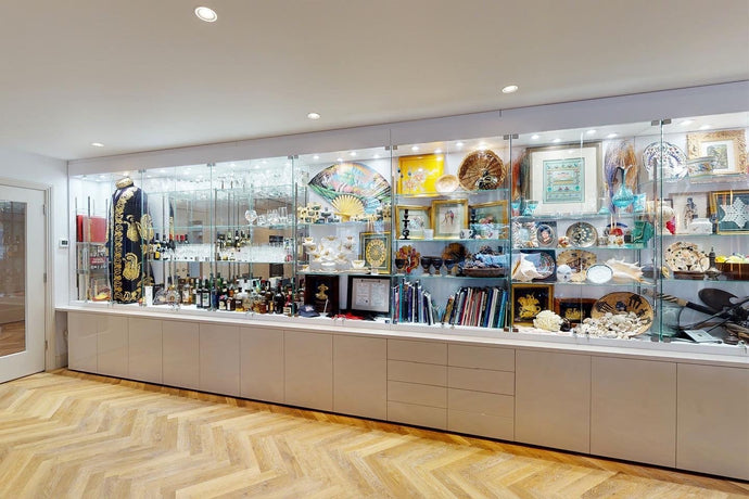 The Art of Display: Why Every Studio Needs Glass Cabinets