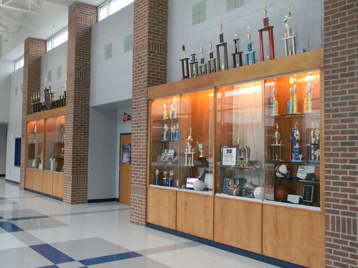 Illuminating Achievements: The Power of Glass Showcases in Schools