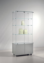 Premier Lite 8.18M Display Cabinet showcasing a modern design with three glass shelves and a lockable base cupboard, ideal for displaying items in style.